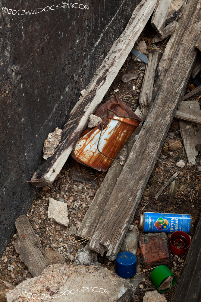 A paint can and a couple of caps remain from the work that was created here.