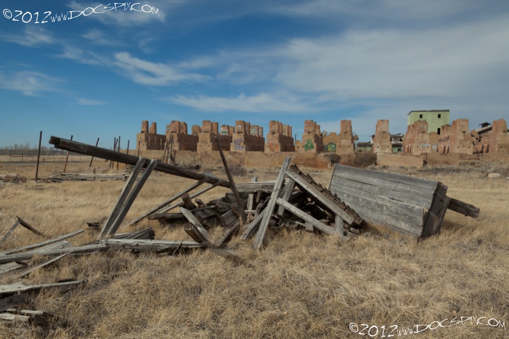 A pair of work benches lie discarded and rotting in the cool March air.