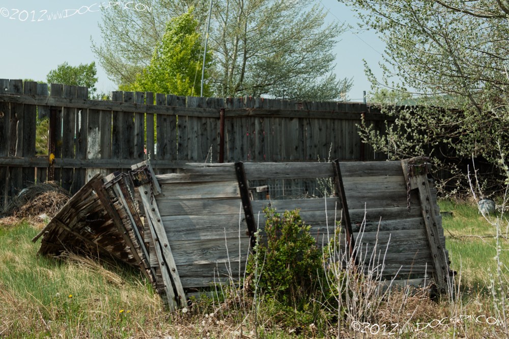 A truck bed rests in the middle of what would be North Pine Street.