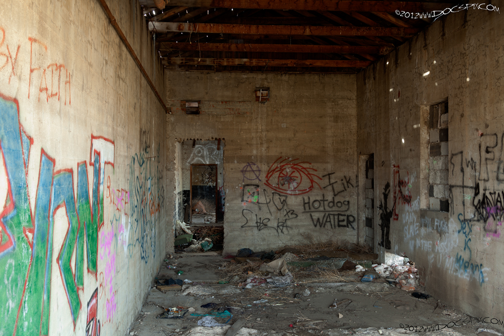 Looking through the garage along the south wall. The "door" was presumably added by one of the subsequent owners after Midwest. 