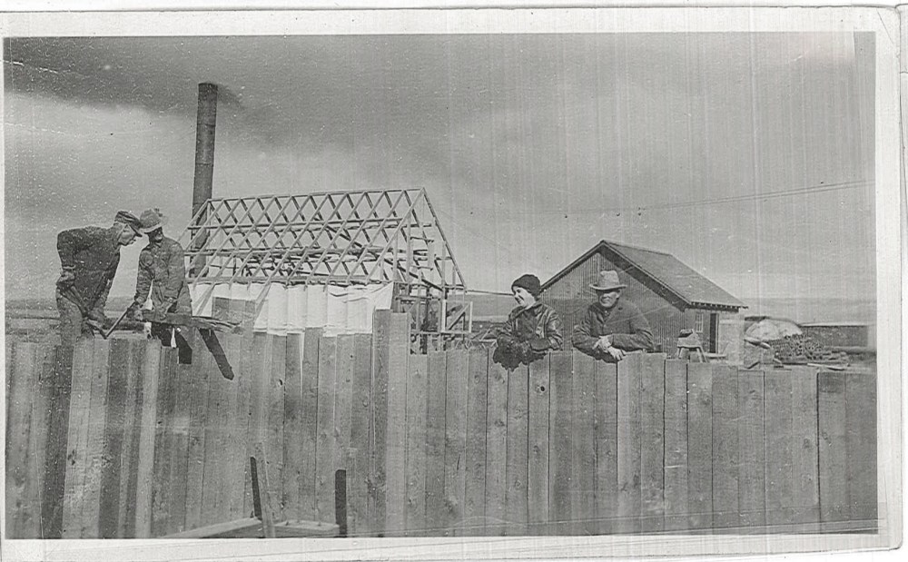 A group of unidentified workmen. 