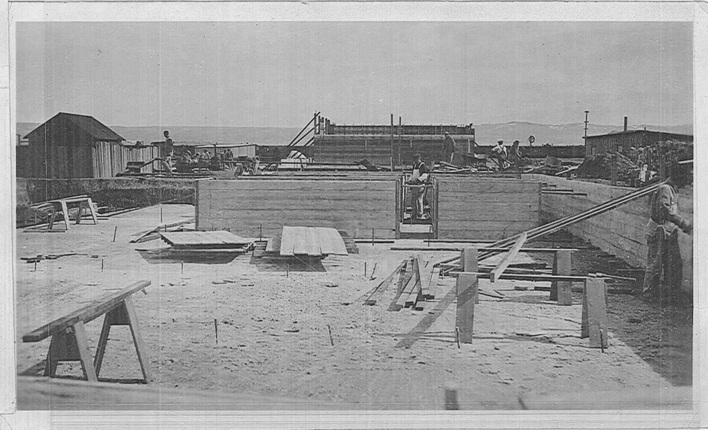 This series of "walls" are presumably buried under the still foundations. The forms for the stills are in the background. 